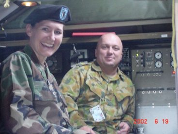 104 Sig Sqn Soldier showing one of the other ABCA Girls his Rig